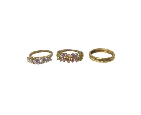 Gold (stamped 916) wedding ring, together with two 14ct gold gem set rings (3)Gold (916) wedding ring weighs 1.2 gramsTwo 14c