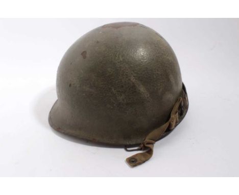 Second World War American rear seam steel paratrooper helmet 1944/1945 heat stamp H96A with liner by Westinghouse. Liner name