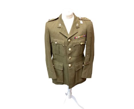 Royal Army Service Corps Captains Service Dress jacket, together with a Police jacket and various R.A.F uniform in a canvas b