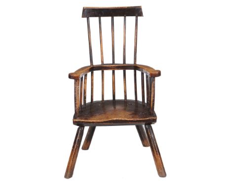 A George III ash and elm comb-back Windsor armchair , circa 1800  A George III ash and elm comb-back Windsor armchair  , circ