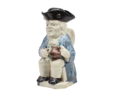 A pearlware Toby jug of so-called 'step' or 'Twyford' type, circa 1780  A pearlware Toby jug of so-called 'step' or 'Twyford'