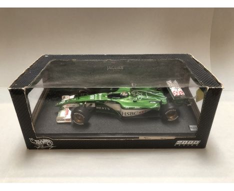 Rare Hotwheels by Mattel F1 racing car in original box, test driver wearing an Italian helmet