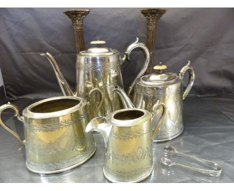 Good Quality silverplate tea and coffee service along with a  pair of Corinthian column candle sticks. 