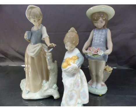 Two Lladro figures and a Nao figure - Lladro 1284 girl with flowers, Lladro 4841 girl with oranges and a Nao figure of a girl