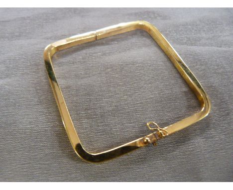 Gold Bangle (tested 14ct or above) of square form. Weight approx 19.1g