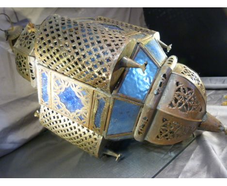 Arabic style hanging light with blue cut glass panels and a drop finial to the bottom