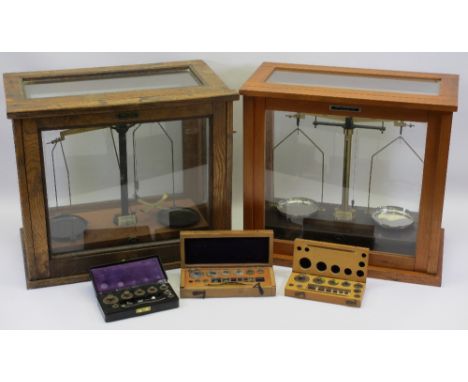 CASED LABORATORY SCALES, TWO SETS by Griffin &amp; George Ltd and James Woolley &amp; Sons &amp; Co, 41cm heights, 44.5 and 4