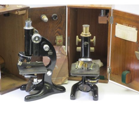 TWO CASED LABORATORY TYPE MICROSCOPES Japanned black in brass and chrome, one marked 'Beck Ltd London' the other 'W R Prior &