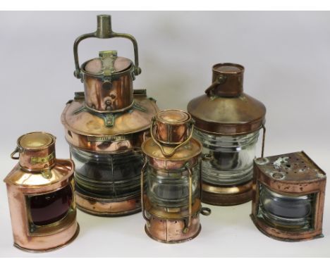 VINTAGE COPPER SHIP'S LAMPS the largest marked Masthead, 30cms H, a smaller example marked Anchor, 24cms H, a port marked lam