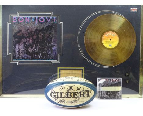 SIGNED MEMORABILIA, TWO ITEMS to include a framed Bon Jovi Limited Edition gold disc 'Slippery When Wet' No 64/500 from The L