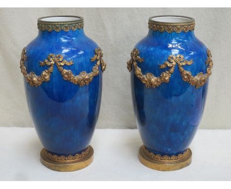 Pair of Victorian glazed cobalt blue coloured ceramic vases, with gilt metal floral and foliate decoration, and piercework de