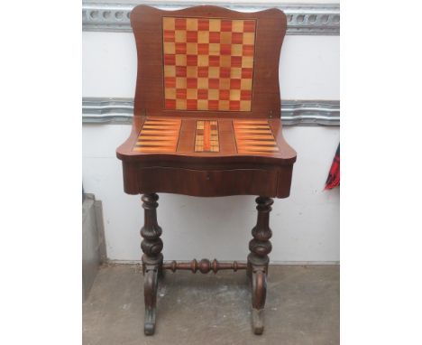 Victorian mahogany serpentine fronted foldover games table, fitted with single drawer and inlaid chess/backgammon board. appr