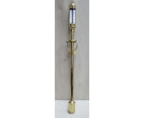 20th century brass ships barometer, with mounted thermometer, hanging loop, and wall mounting bracket, by Russell, Norwich. A