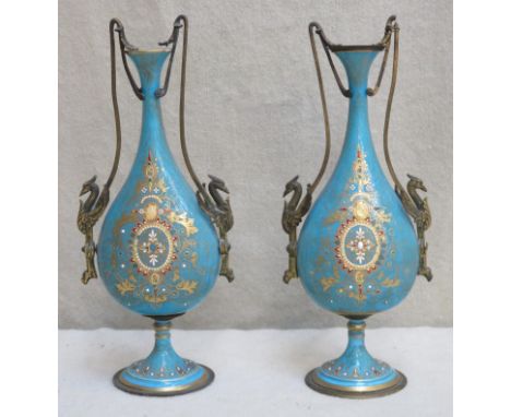 Pair of 19th century french style ceramic vases, with gilded and raised enamelled decoration, with mythical bird form handles