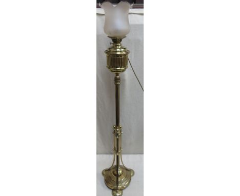 Victorian brass standard lamp with glass shade, modified for electricity. Approx.143cm high 