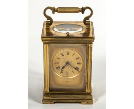 Brass carriage clock French make E.M.&amp; Co, brass dial with retailer Wm Sturrock Paris.  Double spring repeater, in good w
