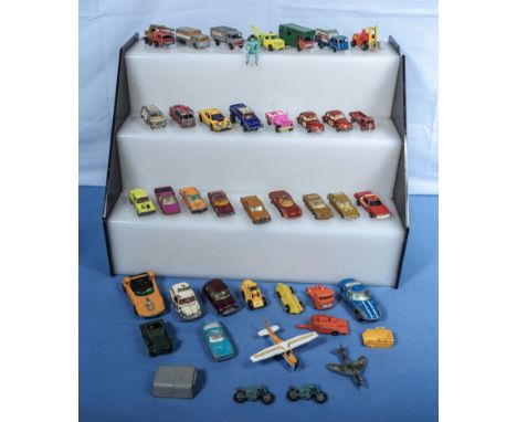A collection of vintage Corgi, Dinky and other play worn die cast vehicles
