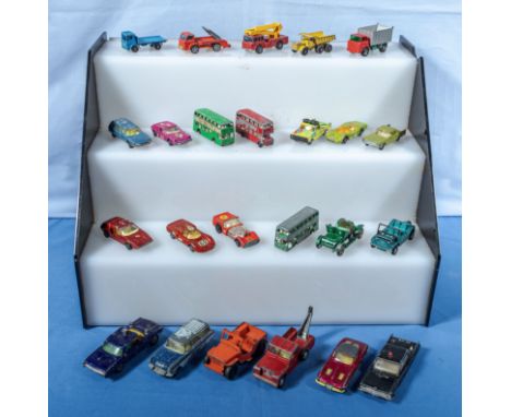 A collection of vintage Corgi, Dinky and other play worn die cast vehicles