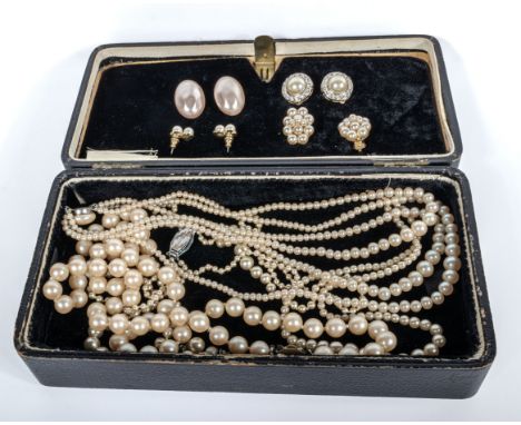 A collection of vintage pearl necklaces and earrings