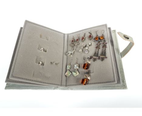 An album containing a quantity of vintage earrings