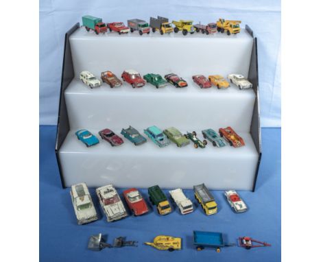 A collection of vintage Corgi, Dinky and other play worn die cast vehicles