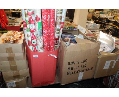 A LARGE QUANTITY OF ASSORTED GIFT ITEMS TO INCLUDE WRAPPING PAPER, NOVELTY MUGS, WEDDING RING PILLOW, PICTURE FRAMES, ETC 