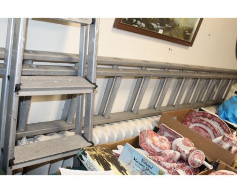 A LARGE SET OF ALUMINIUM LADDERS TOGETHER WITH A SMALL SET OF STEP LADDERS 