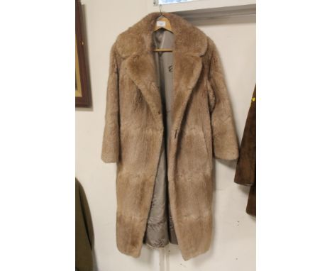 A FULL LENGTH LADIES MUSQUASH FUR COAT SIZE 14 