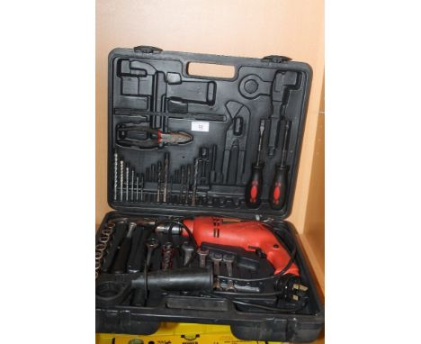 A CASED TOOL SET TO INCLUDE A DRILL, HAMMER, ETC 