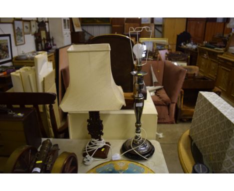 A large silver plated table lamp base; and a Chinese hardwood table lamp and shade 