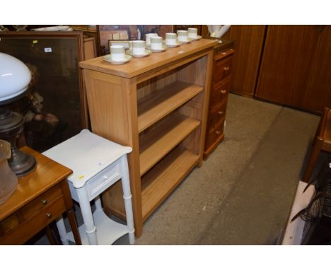 A light oak open fronted bookcase 