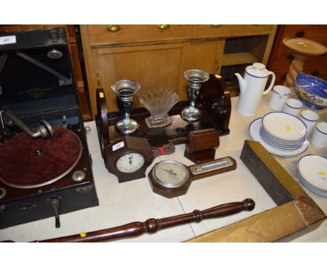 An oak cased barometer; a Bakelite Art Deco mantel clock; a pair of chromed vases; a Bakelite book trough etc. 