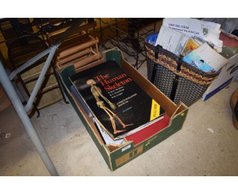 A box of various books to include "The Human Skeleton Photographic Manual"