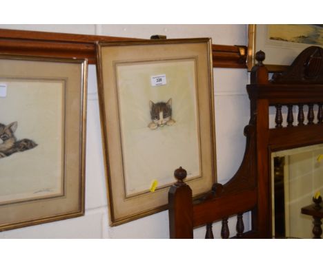 A pencil signed limited edition print depicting a cat in bed 
