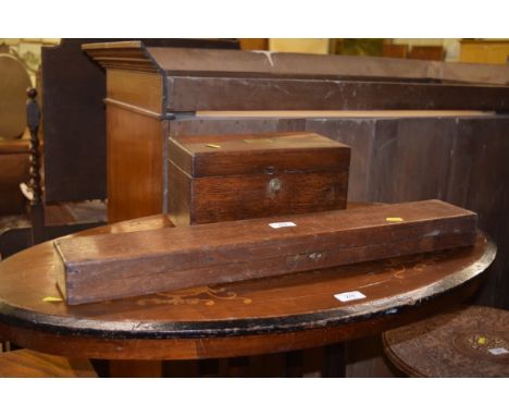 A 19th Century oak storage box; and a wooden arrow box 