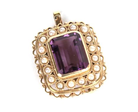 A Continental amethyst and pearl set brooch/pendant, with applied plaque stamped '14K', measures 3cm by 4.1cm.  Gross weight 