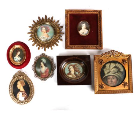 A group of seven 19th and 20th century portrait miniatures depicting ladies