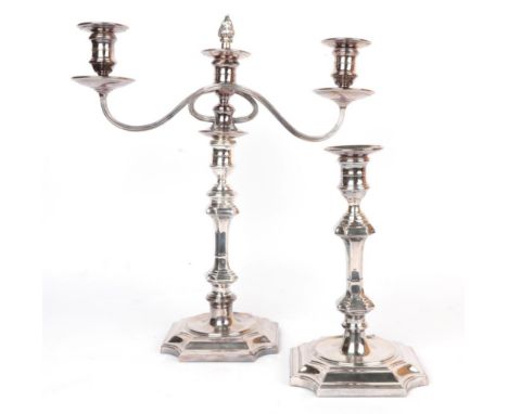 A silver plated three light candelabra and matching silver candlestick