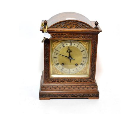 An oak quarter striking mantel clock, movement stamped W&amp;H, retailed by Bowman Limited, London, quarter striking on two g