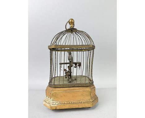 A VICTORIAN AUTOMATON SINGING MUSICAL BIRD IN CAGE28cm x 17cm x 13cm