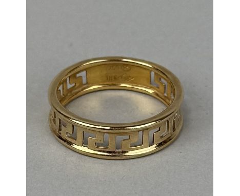 GIANNI VERSACE: AN 18CT GOLD RING WITH GREEK KEY DESIGNWeight: 3.8gmsMarked 'Gianni Versace'. 