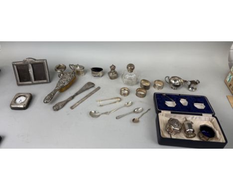 A COLLECTION OF SILVER ITEMS TO INCLUDE VANITY, TONGS, PICTURE FRAME, CLOCK CASE (POCKET WATCH IS SILVER PLATE)Total weight (