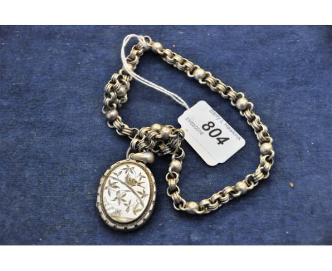 LOCKET AND CHAIN AND BROOCH