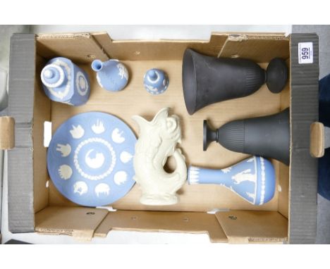 A collection of Wedgwood items to include: un finished black basalt vases, light blue vases &amp; decanter, commemorative pla