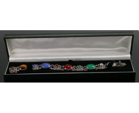 Vintage silver ornate ladies bracelet: set with various coloured polished stones. 