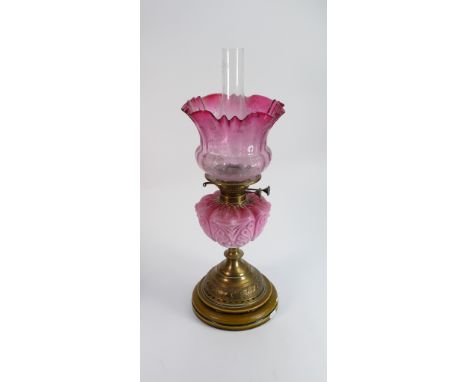 Victorian oil lamp: Pink opaline glass bowl, with brass and potter base.  Old cranberry shade, cracked. 