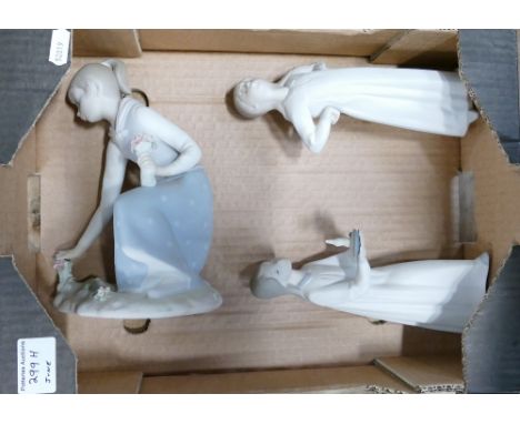Three Lladro figures: Largest 21cm high 