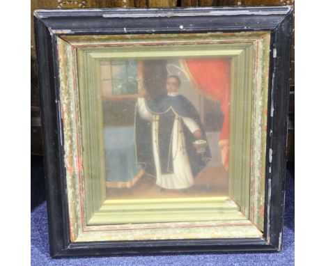 An oil painted portrait of a martyred saint in a gilt and ebonised frame. 23x19cm