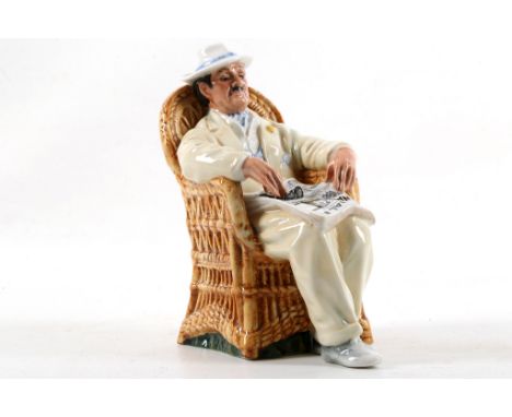 A Royal Doulton porcelain model of a seated gentleman titled 'Taking Things Easy' HN 2680, designed by M. Nicholl, issued 197