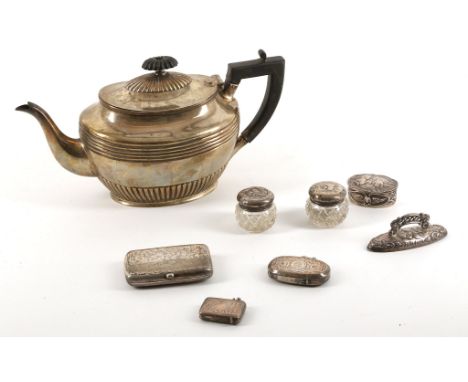 A late Victorian Sheffield hallmarked silver teapot, a Victorian hallmarked silver cigarette box, an Edwardian silver trinket